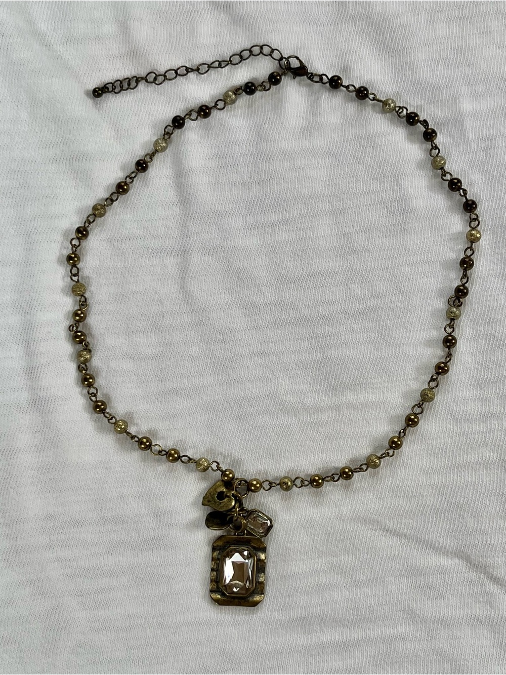 Gold-Tone Beaded Necklace with Clear Gemstone Pendant